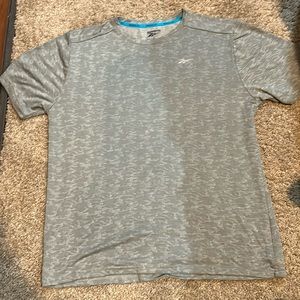 grey reebok shirt